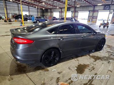 Trzecie zdjęcie samochodu z tyłu: 2016 FORD FUSION SE VIN:3FA6P0H75GR323905 - miniatura