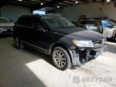 Czwarte zdjęcie samochodu z boku: 2016 VOLKSWAGEN TOUAREG SPORT VIN:WVGEF9BP8GD012916 - miniatura