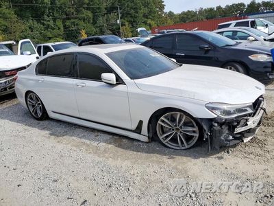 Czwarte zdjęcie samochodu z boku: 2019 BMW 750 XI VIN:WBA7F2C53KB240535 - miniatura