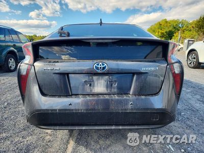 Zdjęcie 6 z 13 samochodu: 2017 TOYOTA PRIUS TWO VIN:JTDKBRFU4H3041727 - miniatura