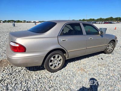 Trzecie zdjęcie samochodu z tyłu: 2002 MAZDA 626 LX VIN:1YVGF22C025302565 - miniatura