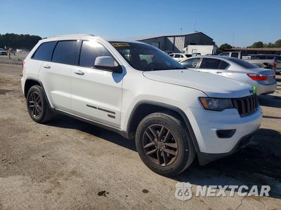 Czwarte zdjęcie samochodu z boku: 2016 JEEP GRAND CHEROKEE LAREDO VIN:1C4RJEAG8GC336176 - miniatura