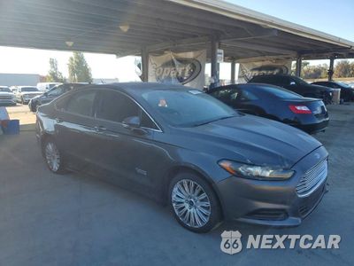 Czwarte zdjęcie samochodu z boku: 2015 FORD FUSION TITANIUM PHEV VIN:3FA6P0SUXFR247790 - miniatura