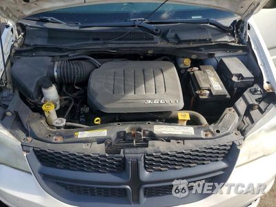Zdjęcie 12 z 13 samochodu: 2012 DODGE RAM VAN VIN:2C4RDGAG4CR206741 - miniatura