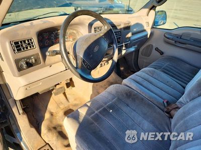Zdjęcie 8 z 12 samochodu: 1999 FORD F250 SUPER DUTY VIN:1FTNF20LXXEB36692 - miniatura