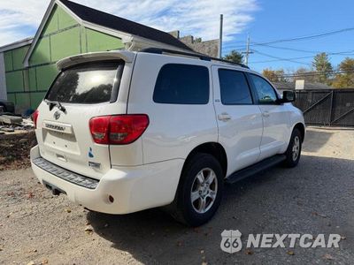 Czwarte zdjęcie samochodu z boku: 2014 TOYOTA SEQUOIA SR5 VIN:5TDBY5G10ES100388 - miniatura