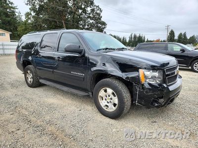 Czwarte zdjęcie samochodu z boku: 2013 CHEVROLET SUBURBAN K1500 LT VIN:1GNSKJE72DR305958 - miniatura