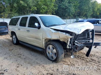Czwarte zdjęcie samochodu z boku: 2010 CHEVROLET SUBURBAN VIN:1GNUCKE00AR283243 - miniatura