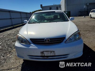 Piąte zdjęcie samochodu w środku: 2003 TOYOTA CAMRY LE VIN:4T1BE30K13U167375 - miniatura