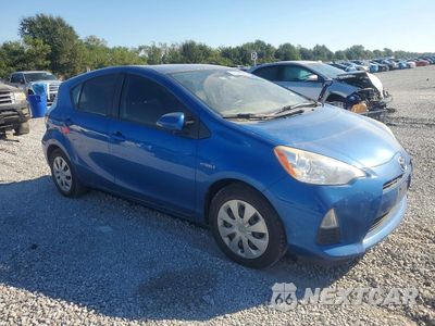 Czwarte zdjęcie samochodu z boku: 2014 TOYOTA PRIUS C TWO VIN:JTDKDTB32E1065181 - miniatura