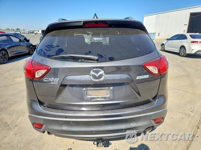 Zdjęcie 6 z 13 samochodu: 2014 MAZDA CX-5 GT VIN:JM3KE4DY1E0342508 - miniatura