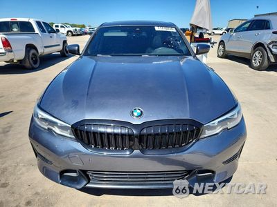Piąte zdjęcie samochodu w środku: 2021 BMW 330I VIN:3MW5R1J06M8C13754 - miniatura