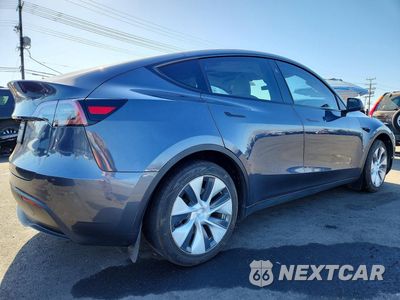Trzecie zdjęcie samochodu z tyłu: 2023 TESLA MODEL Y VIN:7SAYGDED3PF940289 - miniatura