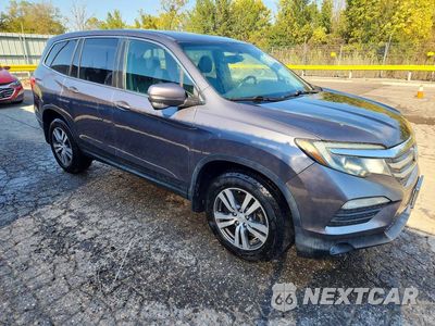 Czwarte zdjęcie samochodu z boku: 2017 HONDA PILOT EXLN VIN:5FNYF6H72HB027204 - miniatura