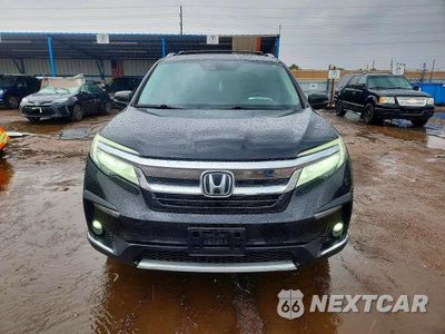 Piąte zdjęcie samochodu w środku: 2020 HONDA PILOT ELITE VIN:5FNYF6H00LB037709 - miniatura