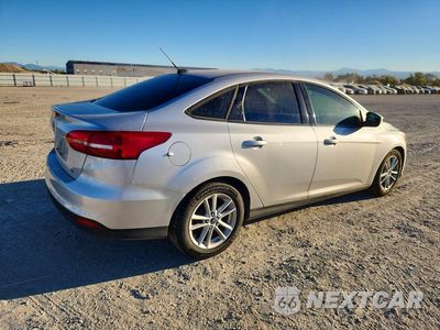 Trzecie zdjęcie samochodu z tyłu: 2015 FORD FOCUS SE VIN:1FADP3F24FL289288 - miniatura