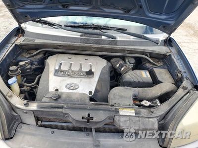Zdjęcie 12 z 13 samochodu: 2006 HYUNDAI TUCSON GLS VIN:KM8JN72D36U422565 - miniatura
