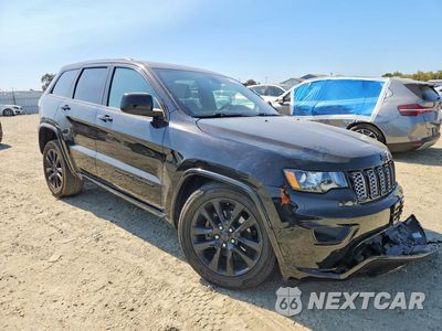 Czwarte zdjęcie samochodu z boku: 2019 JEEP GRAND CHEROKEE LAREDO VIN:1C4RJEAGXKC852340 - miniatura