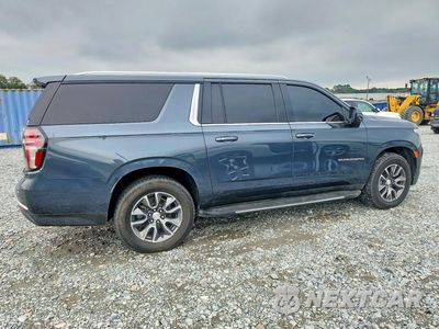 Trzecie zdjęcie samochodu z tyłu: 2021 CHEVROLET SUBURBAN C1500 LT VIN:1GNSCCKD1MR147406 - miniatura