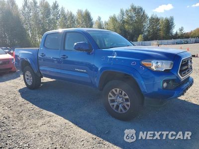 Czwarte zdjęcie samochodu z boku: 2016 TOYOTA TACOMA SR5 V6 VIN:3TMCZ5AN4GM015229 - miniatura
