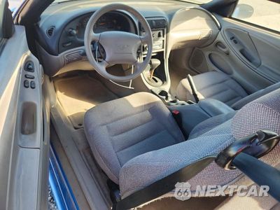 Zdjęcie 8 z 12 samochodu: 1998 FORD MUSTANG VIN:1FAFP4049WF166609 - miniatura