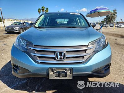 Piąte zdjęcie samochodu w środku: 2014 HONDA CR-V LX VIN:2HKRM4H38EH699017 - miniatura