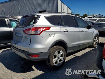 Trzecie zdjęcie samochodu z tyłu: 2016 FORD ESCAPE SE VIN:1FMCU9GX7GUA65757 - miniatura