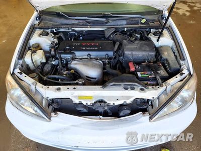 Zdjęcie 11 z 12 samochodu: 2004 TOYOTA CAMRY LE VIN:4T1BE32K24U294053 - miniatura