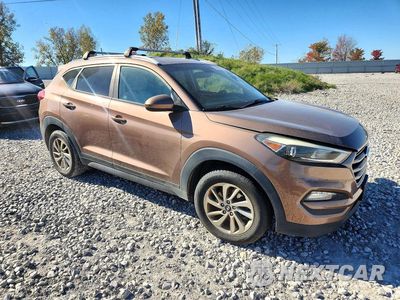 Czwarte zdjęcie samochodu z boku: 2016 HYUNDAI TUCSON SE VIN:KM8J3CA43GU157664 - miniatura