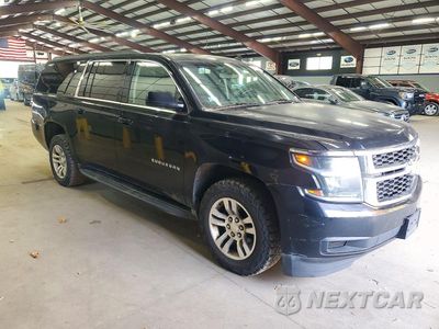 Czwarte zdjęcie samochodu z boku: 2015 CHEVROLET SUBURBAN K1500 LS VIN:1GNSKHKCXFR162688 - miniatura
