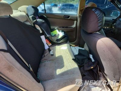 Zdjęcie 10 z 12 samochodu: 2002 TOYOTA CAMRY LE VIN:4T1BE32K12U595748 - miniatura
