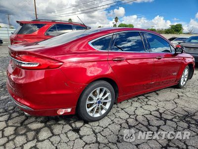 Trzecie zdjęcie samochodu z tyłu: 2017 FORD FUSION SE PHEV VIN:3FA6P0PU0HR329698 - miniatura