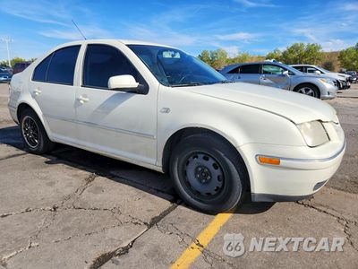 Czwarte zdjęcie samochodu z boku: 2004 VOLKSWAGEN JETTA GL VIN:3VWRK69M94M131258 - miniatura