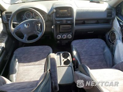 Zdjęcie 8 z 13 samochodu: 2003 HONDA CR-V LX VIN:SHSRD78433U112561 - miniatura