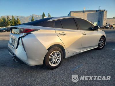 Trzecie zdjęcie samochodu z tyłu: 2016 TOYOTA PRIUS TWO VIN:JTDKBRFU1G3524493 - miniatura