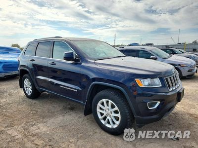 Czwarte zdjęcie samochodu z boku: 2015 JEEP GRAND CHEROKEE LAREDO VIN:1C4RJFAGXFC603483 - miniatura