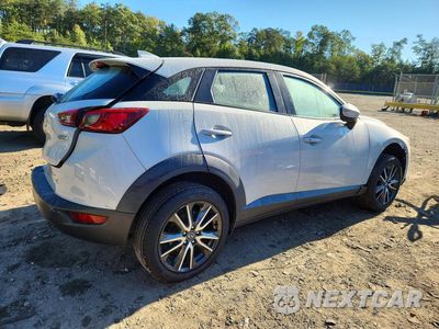 Trzecie zdjęcie samochodu z tyłu: 2018 MAZDA CX-3 TOURING VIN:JM1DKFC75J1305626 - miniatura