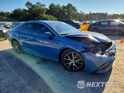Czwarte zdjęcie samochodu z boku: 2023 TOYOTA CAMRY HYBRID SE VIN:4T1S31AKXPU056385 - miniatura