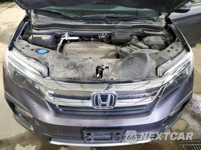 Zdjęcie 11 z 12 samochodu: 2020 HONDA PILOT EXL VIN:5FNYF6H57LB060643 - miniatura