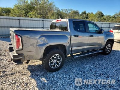 Trzecie zdjęcie samochodu z tyłu: 2022 GMC CANYON AT4 VIN:1GTG6FEN6N1176198 - miniatura