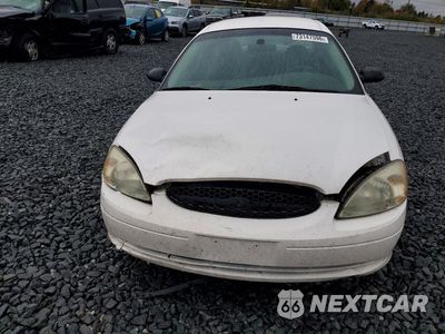 Piąte zdjęcie samochodu w środku: 2003 FORD TAURUS LX VIN:1FAFP52223A154229 - miniatura