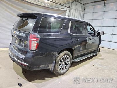 Trzecie zdjęcie samochodu z tyłu: 2021 CHEVROLET TAHOE K1500 LT VIN:1GNSKNKDXMR175946 - miniatura
