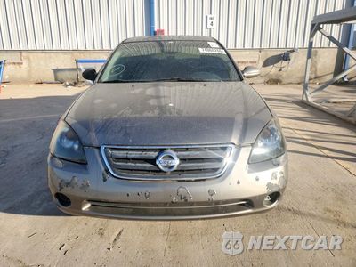Piąte zdjęcie samochodu w środku: 2002 NISSAN ALTIMA 2.5 VIN:1N4AL11D32C237169 - miniatura
