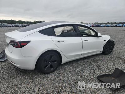 Trzecie zdjęcie samochodu z tyłu: 2023 TESLA MODEL 3 VIN:5YJ3E1EAXPF574249 - miniatura