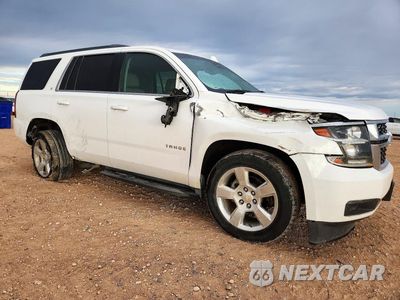 Czwarte zdjęcie samochodu z boku: 2015 CHEVROLET TAHOE C1500 LT VIN:1GNSCBKC1FR637607 - miniatura