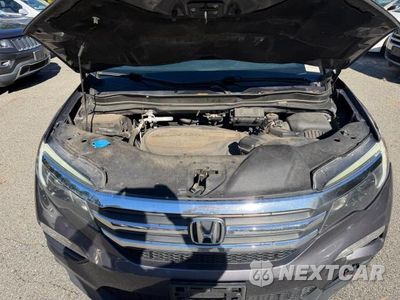 Zdjęcie 7 z 13 samochodu: 2018 HONDA PILOT EXL VIN:5FNYF6H50JB062568 - miniatura