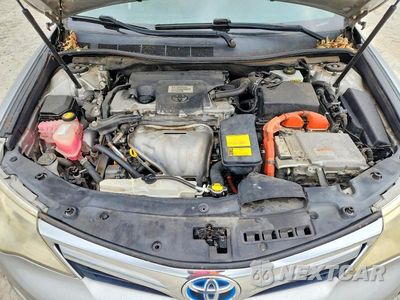 Zdjęcie 11 z 12 samochodu: 2014 TOYOTA CAMRY HYBRID LE VIN:4T1BD1FK3EU122214 - miniatura