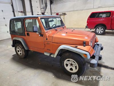 Czwarte zdjęcie samochodu z boku: 2001 JEEP WRANGLER / TJ SPORT VIN:1J4FA49SX1P329150 - miniatura