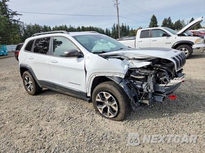 Czwarte zdjęcie samochodu z boku: 2014 JEEP CHEROKEE TRAILHAWK VIN:1C4PJMBS1EW160359 - miniatura