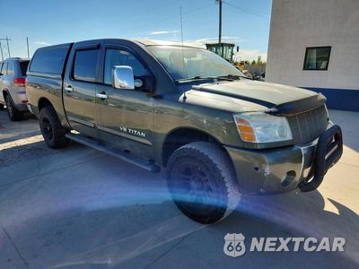 Czwarte zdjęcie samochodu z boku: 2005 NISSAN TITAN VIN:1N6AA07B35N570512 - miniatura